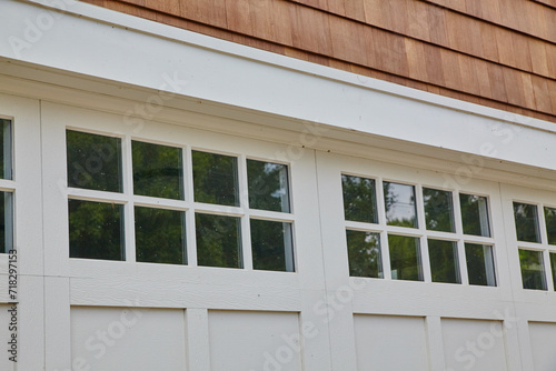 Classic White Windows and Cedar Shake Siding Detail