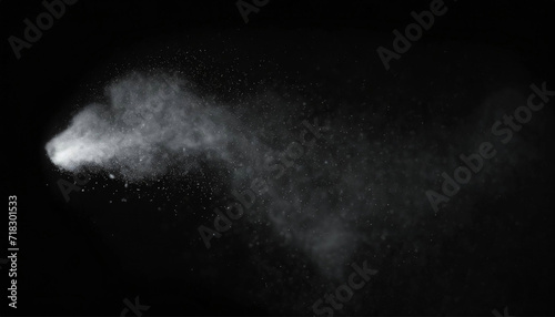 Natural dust particles flow in air on black background photo