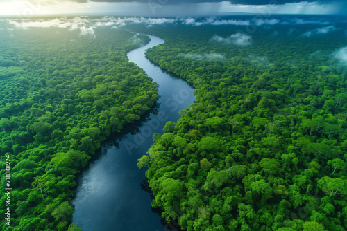 aerial view of a foggy tropical rainforest during river flood