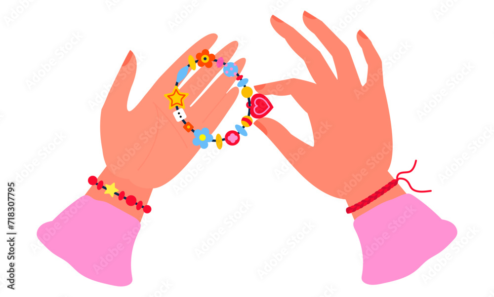 Obraz premium Beads bracelet in hands. Cartoon cute bracelet made of colorful beads different shapes and color. Plastic jewelry for wrist. Friendship retro bracelet with hand isolated on white background.