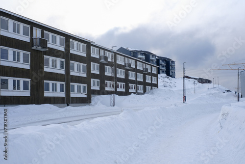 Buildings in the Capital of Greenland, Nuuk, with a road, during the winter