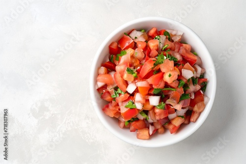 Small Bowl of Homemade Mexican Pico de Gallo sauce, with tomatoes, peppers, jalapenos and red onions