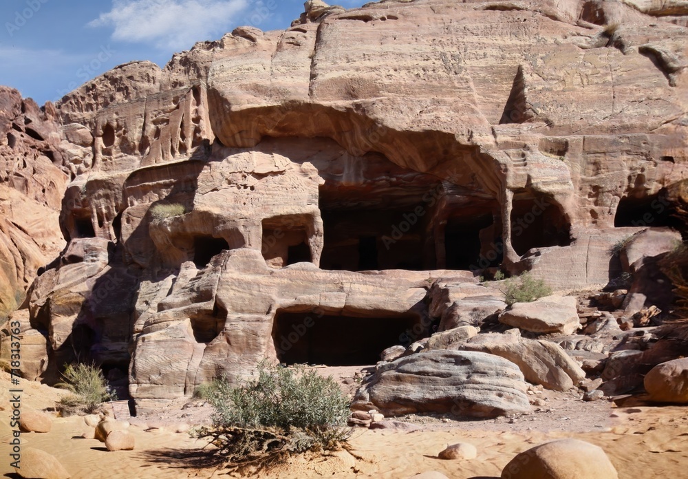Petra's cliff dwellings are an important feature of the city. They were carved into the rock and vary in size and shape. Petra's cliff dwellings are an important feature of the city. They were carved into the rock and vary in size and shape.