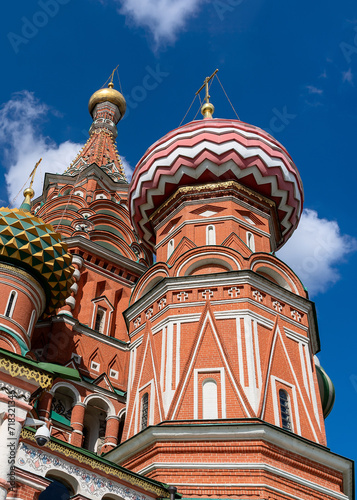 A fragment of St. Basil's Cathedral against the blue sky.