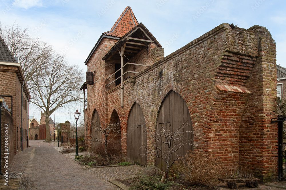 Medieval city wall with defense tower in the city of Zutphen. Medieval city wall with defense tower in the city of Zutphen.