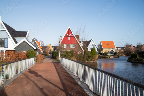 Residential area with modern, contemporary houses on the water.