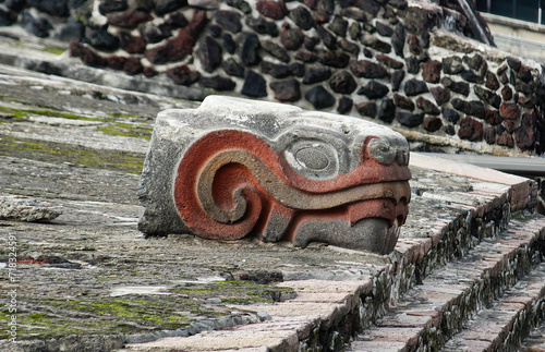 Stone Snake Head Of Aztec God Quetzalcoatl In Tenochtitlan Ruins,(templo Mayor) Mexico City photo