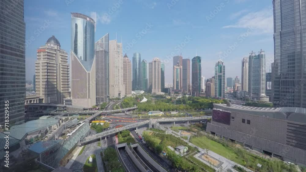 Crossroad traffic among skyscrapers at autumn day. Timelapse Crossroad traffic among skyscrapers at autumn day. Timelapse