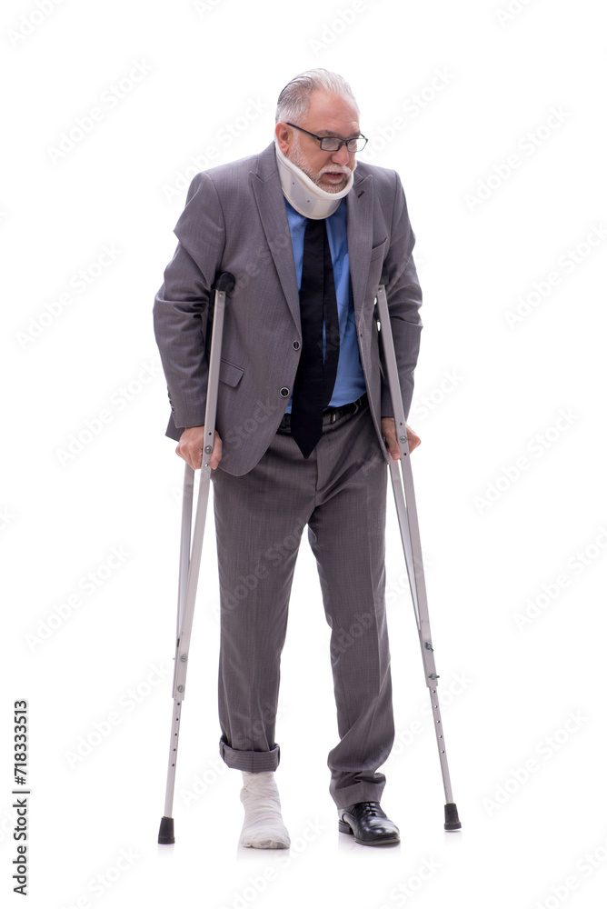 Old businessman after car accident isolated on white Old businessman after car accident isolated on white