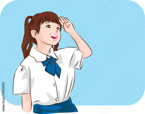 The young Asian student with uniform standing to presenting on the blue background. 