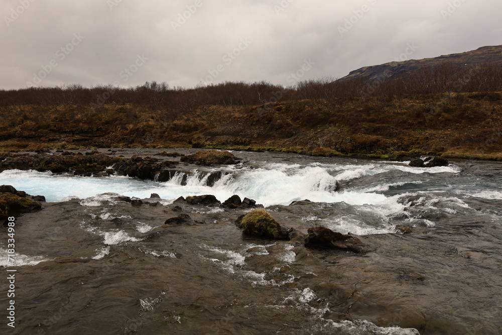 Brúará is a spring-fed river in West Iceland which runs by the boundaries of municipalities Biskupstungur and Grímsnes