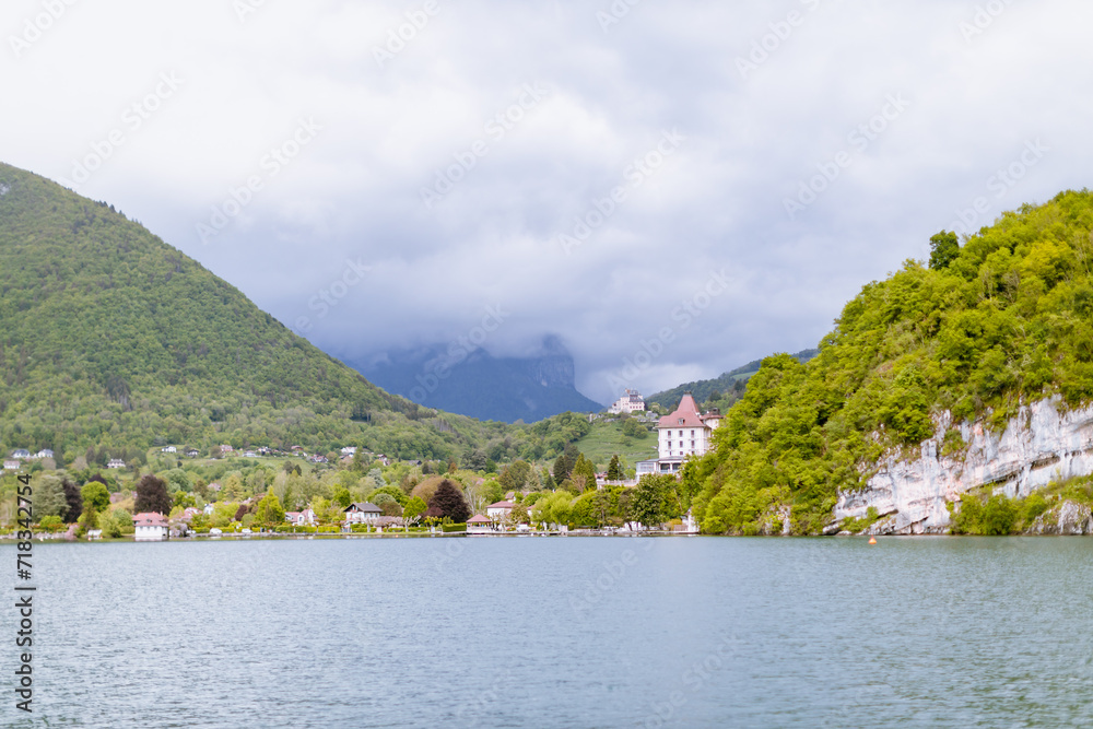 Scenic Lake Annecy beautiful mountains and coast - (French: Lac d'Annecy)