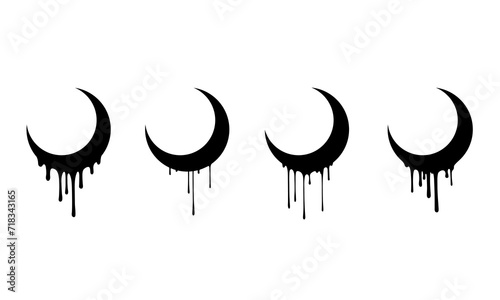 Вlack crescent moon with drips of liquid on a white background photo