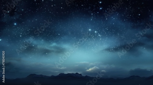  a night sky with stars and clouds and a mountain range in the foreground with the moon and stars in the distance.