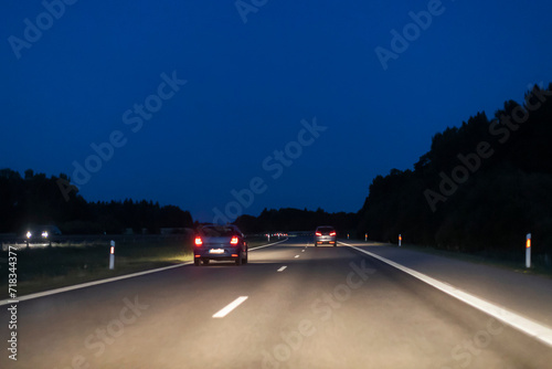 Driving in lithuania at night on highway to capital city.
