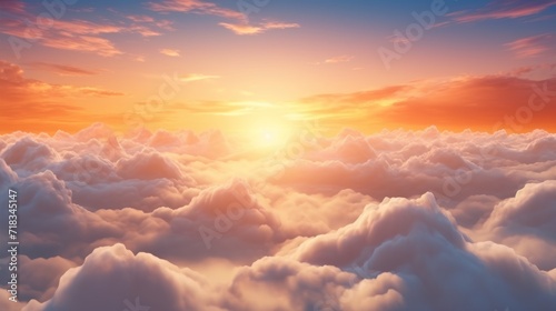 the sun is setting over the clouds in the sky as seen from the top of a plane in the sky. photo