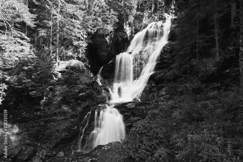 Fototapeta Naklejka Na Ścianę i Meble -  Riesach waterfall in Untertal Valley, Rohrmoos-Untertal in Schladminger Alps, Austria. Black and white photography.