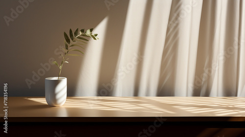Minimalistic a light beige background for product presentation with light and intricate shadow from the window and wall.