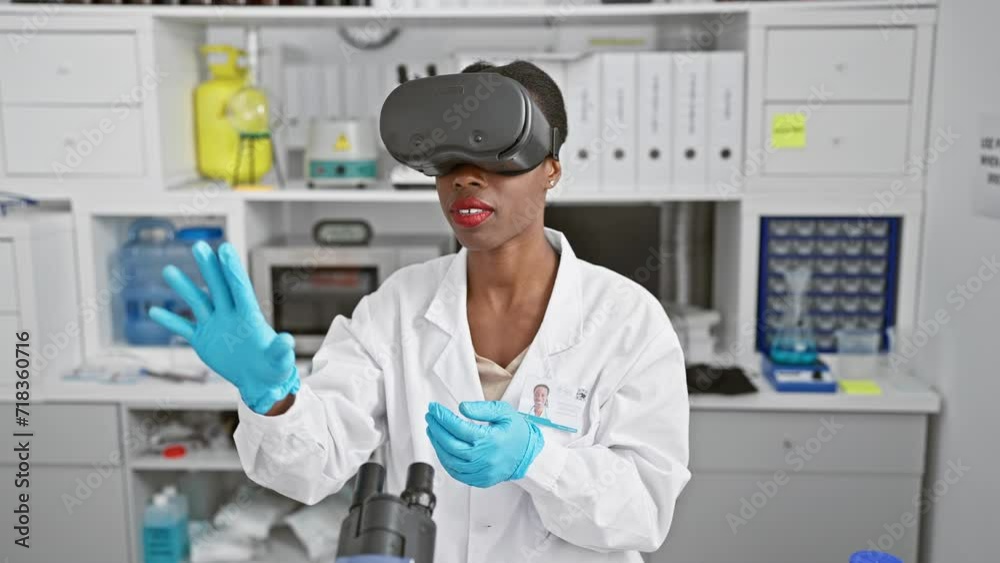 African american woman scientist conducting medical research in lab, using cutting-edge virtual reality glasses for a dynamic video call African american woman scientist conducting medical research in lab, using cutting-edge virtual reality glasses for a dynamic video call