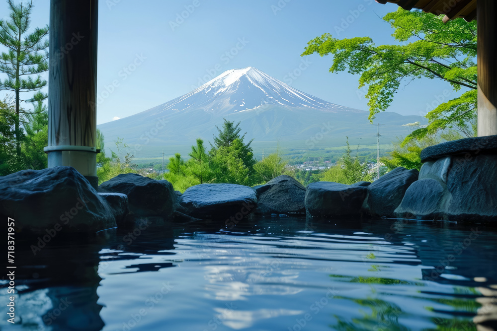 Japanese hot spring with a view of Mount Fuji in the background
