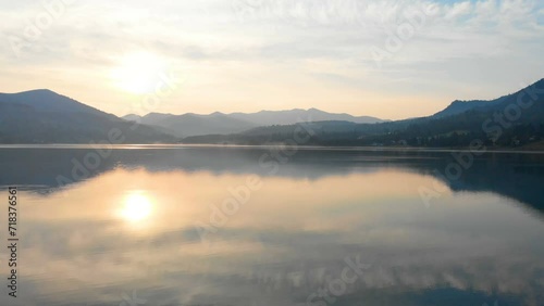 lake in the mountains at sunset