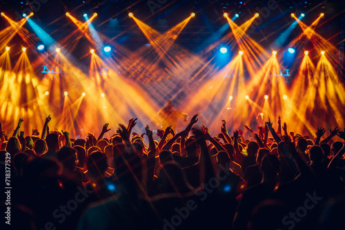 Принти на полотні Concert crowd dancing and having fun while performer is singing on stage