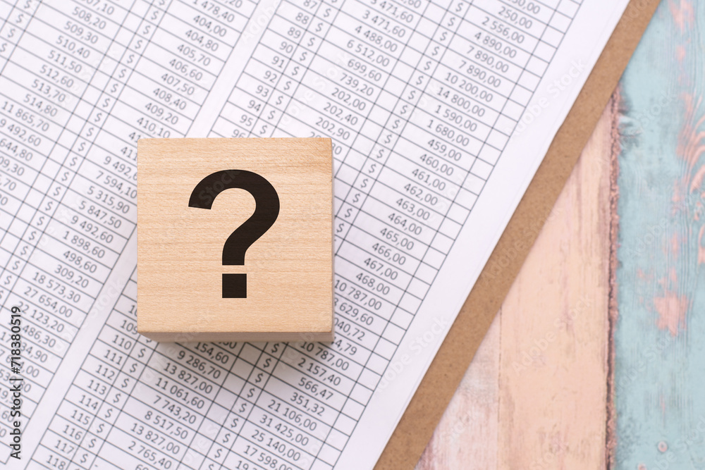 question mark on wooden cube, education and business concept, searching for answers, thoughts for solving a problem, having doubts. top view. question mark on wooden cube, education and business concept, searching for answers, thoughts for solving a problem, having doubts. top view.