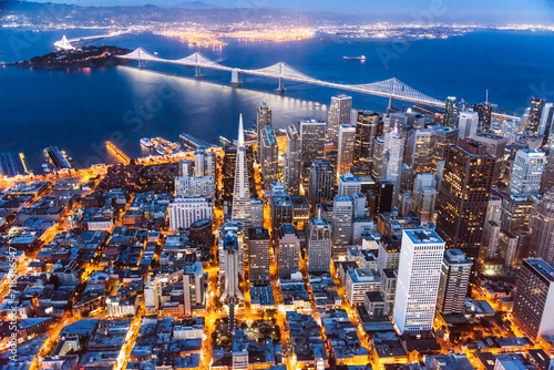 Aerial of downtown, Bay bridge and Oakland, San Francisco, USA photo