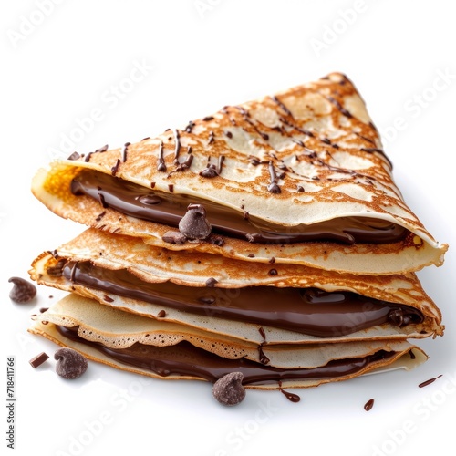 Delicious crepes with chocolate spread isolated on white