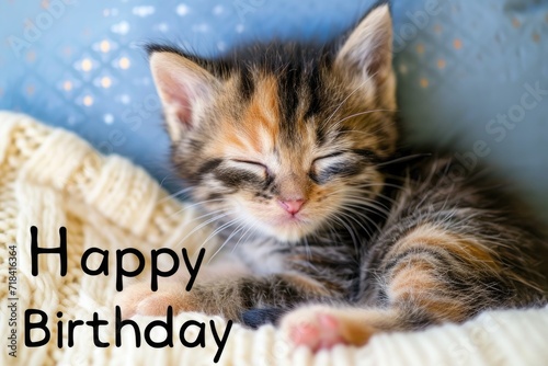 Happy birthday card with an image of a cute sleeping kitten.