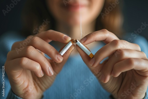Close up view of a girl breaking a cigarette in front camera generative ai