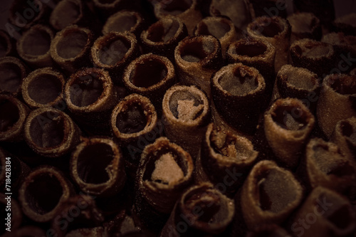 selective focus, the dark background of the chocolate wafer stick arrangement.