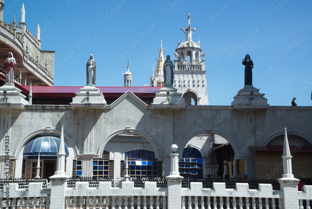 Naklejka premium The Monastery of the Holy Eucharist, also known as the Our Lady of Lindogon Shrine and commonly known as the Simala Shrine or the Simala Parish Church is a Roman Catholic pilgrimage church.Philippine
