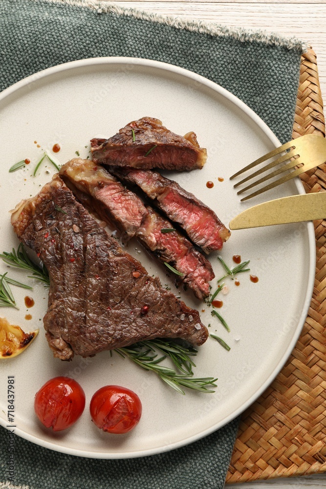 Delicious grilled beef steak served on table, top view Delicious grilled beef steak served on table, top view