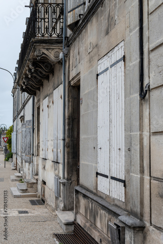 Fototapeta Naklejka Na Ścianę i Meble -  View on old streets and houses in Cognac white wine region, Charente, walking in town Cognac with strong spirits distillation industry, France