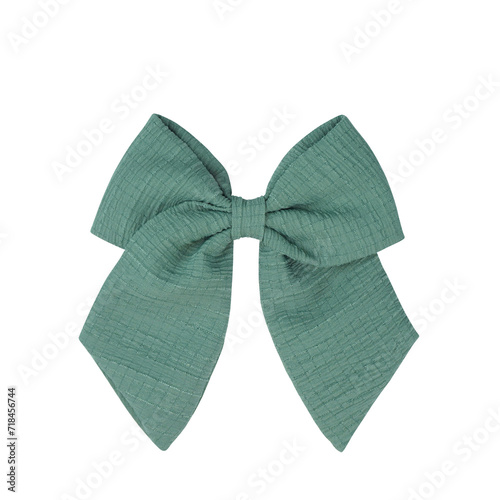 Green sailor bow against white backdrop - a charming accessory for any occasion.