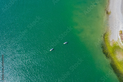 Paddle boarding Wrightsville Beach North Carolina aerial from above.