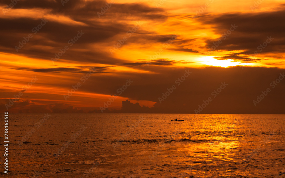 Evening sky over ocean. Golden hour sunset over the sea