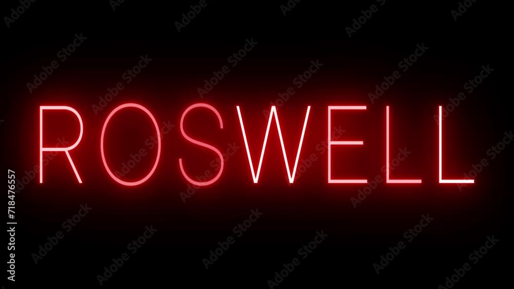 Flickering red retro style neon sign glowing against a black background for ROSWELL Flickering red retro style neon sign glowing against a black background for ROSWELL