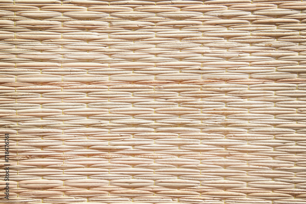 Obraz premium Weaving straw mat horizontal light brown background with seamless patterns