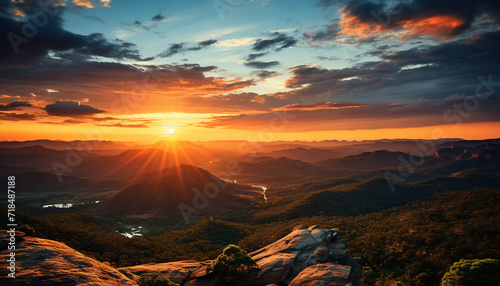 Sunset over majestic mountain range, a tranquil scene of natural beauty generated by AI