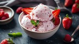 Indulge in the sweetness of creamy ice cream adorned with a topping of fresh strawberries
