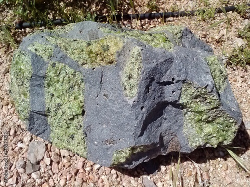 Volcanic rock with the semi-precious gemstone, peridot
