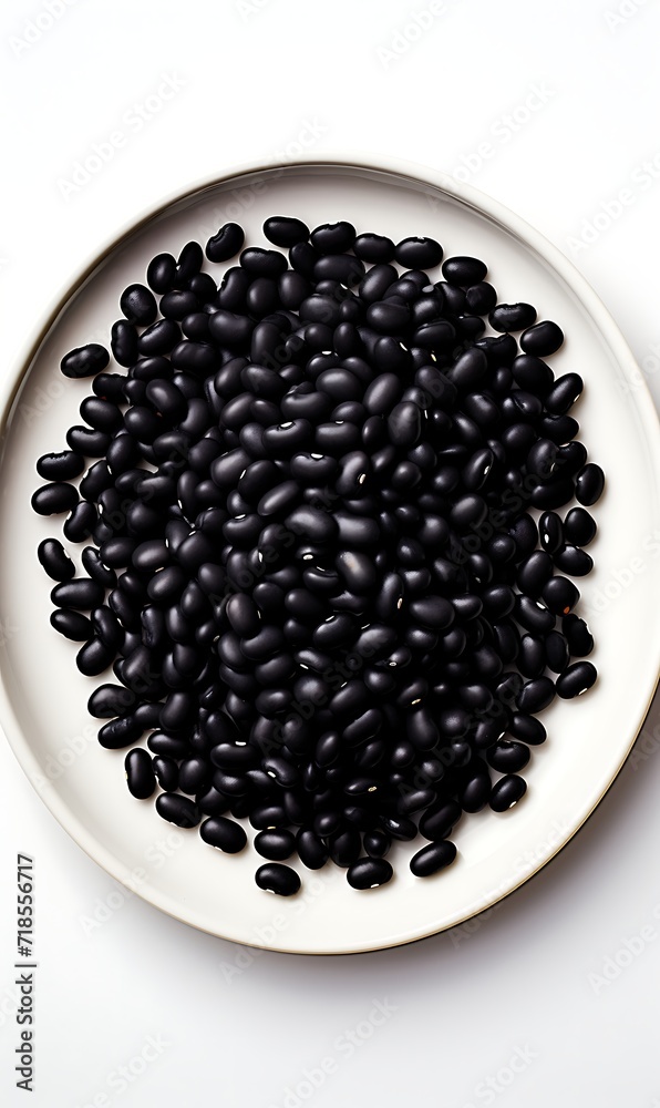 Black beans on plate on white background. Fresh Black beans. Black beans on plate on white background. Fresh Black beans.