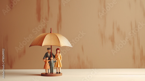 Health and insurance concept. People or family under umbrella.