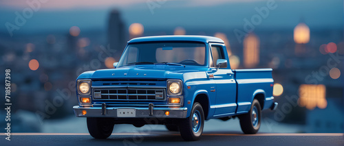 retro blue pickup car with a city in the background © Beyond Pixels