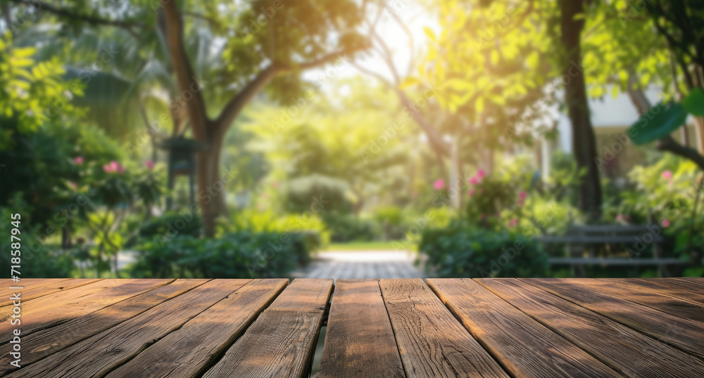 Wooden table and blurred background of the garden with trees Wooden table and blurred background of the garden with trees