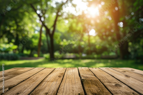 Wooden table top blurred nature garden park background 
