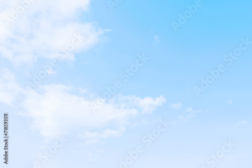 Pastel blue sky with white cloud. Soft light blue background. Cloudscape background. Beautiful nature. Romance backdrop. Freedom of life, New life beginning, Positive energy concepts. Copy space.