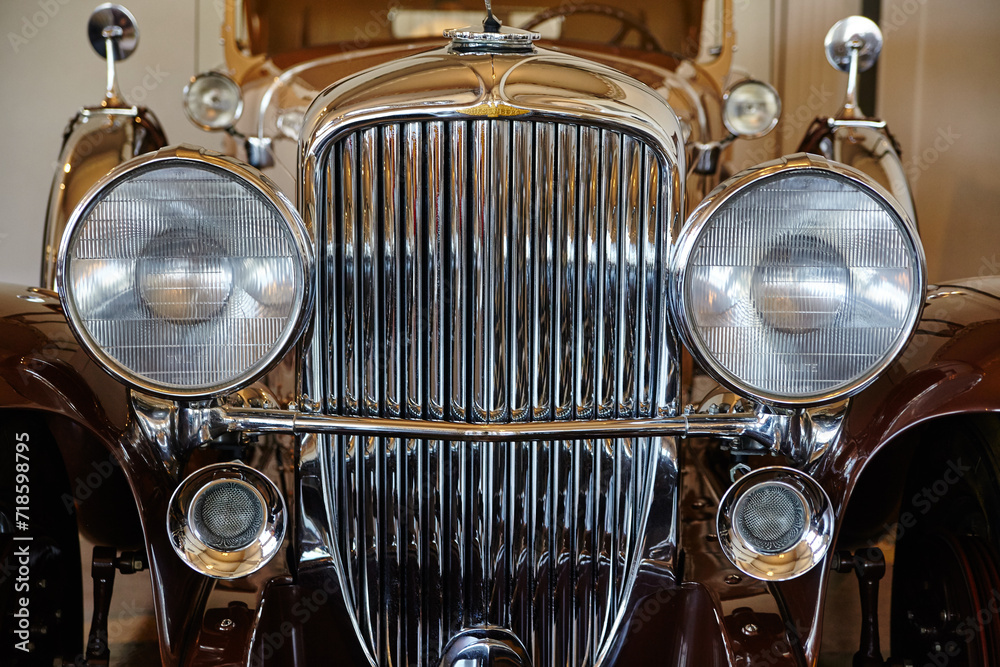 Vintage Car Chrome Grille and Emblem Close-Up